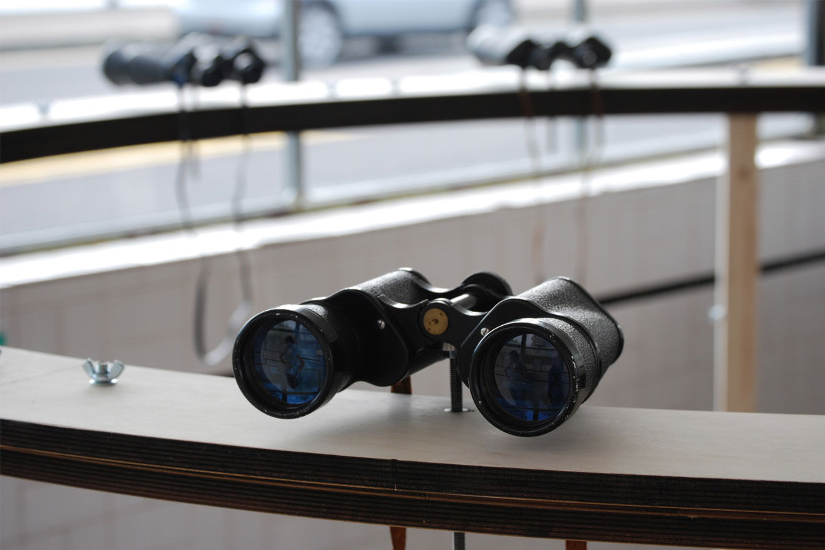 Circular structure with binoculars inside bridge cabin