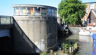 Wooden structure with patchwork colour and texture inside bridge cabin
