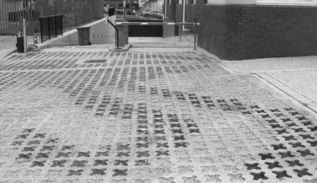 a picture of a concrete floor with green square